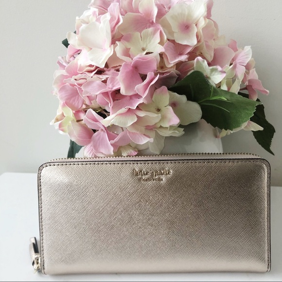 kate spade Handbags - NWT Kate Spade Large Zip-Around Wallet Pale Gold